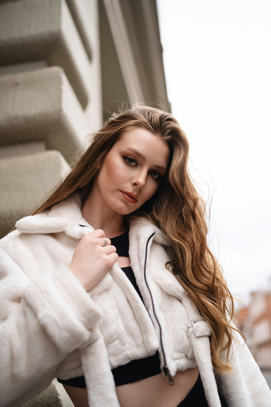 XAYWEAR ivory women jacket with soft texture and cropped design worn by model outdoors