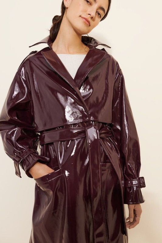 XAYWEAR shiny burgundy leather coat for women with belted waist and long sleeves