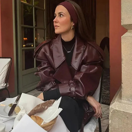 XAYWEAR burgundy women jacket leather oversized blazer style jacket worn by woman at cafe with headband and gold earrings