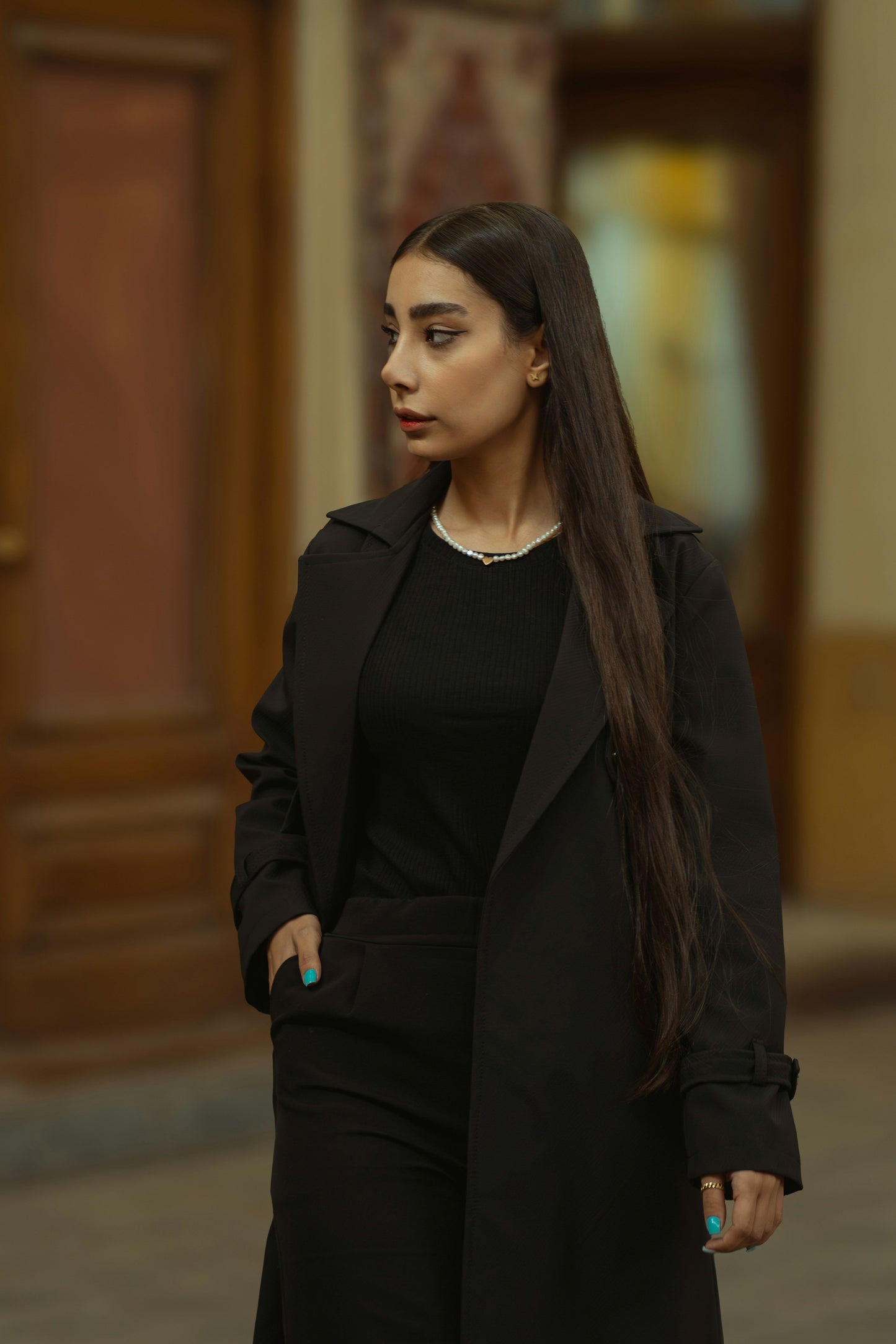 Elegant XAYWEAR luxury black coat for women styled with a chic outfit, perfect for any occasion