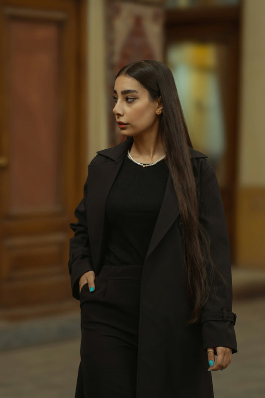 Elegant XAYWEAR luxury black coat for women styled with a chic outfit, perfect for any occasion
