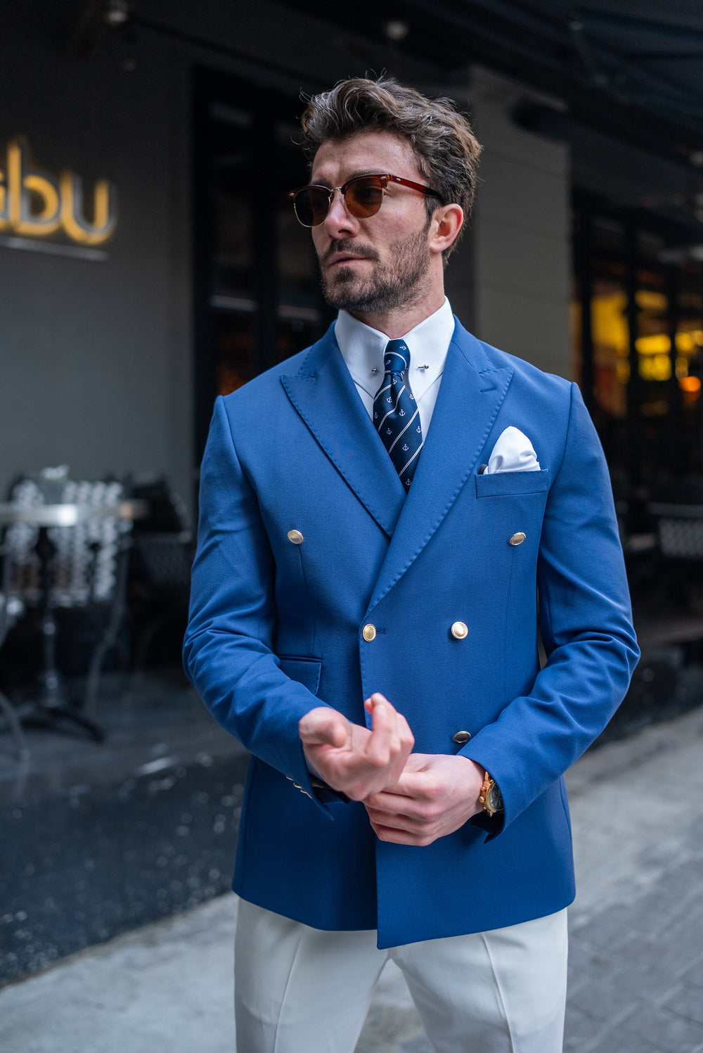 XAYWEAR men blazer suit in blue double-breasted style worn with white shirt and patterned tie