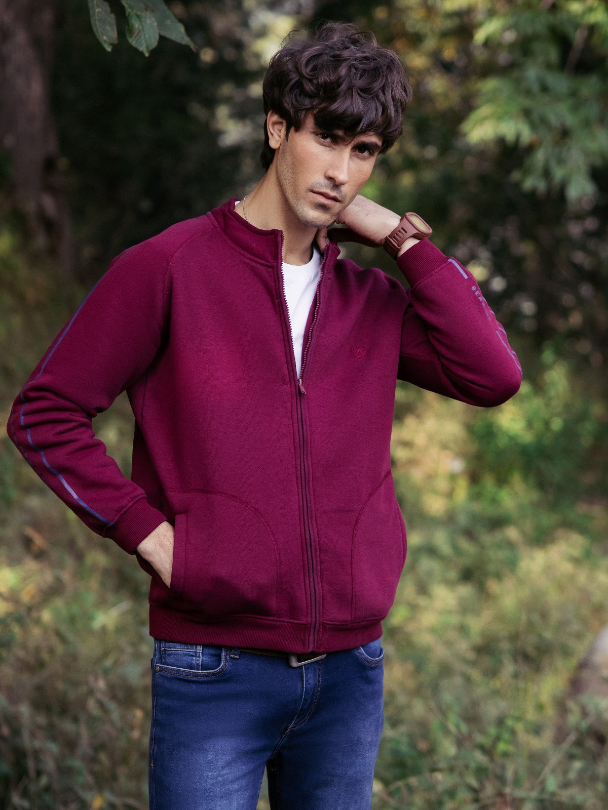 XAYWEAR men casual jacket in maroon with full zip and pocket detailing worn outdoors