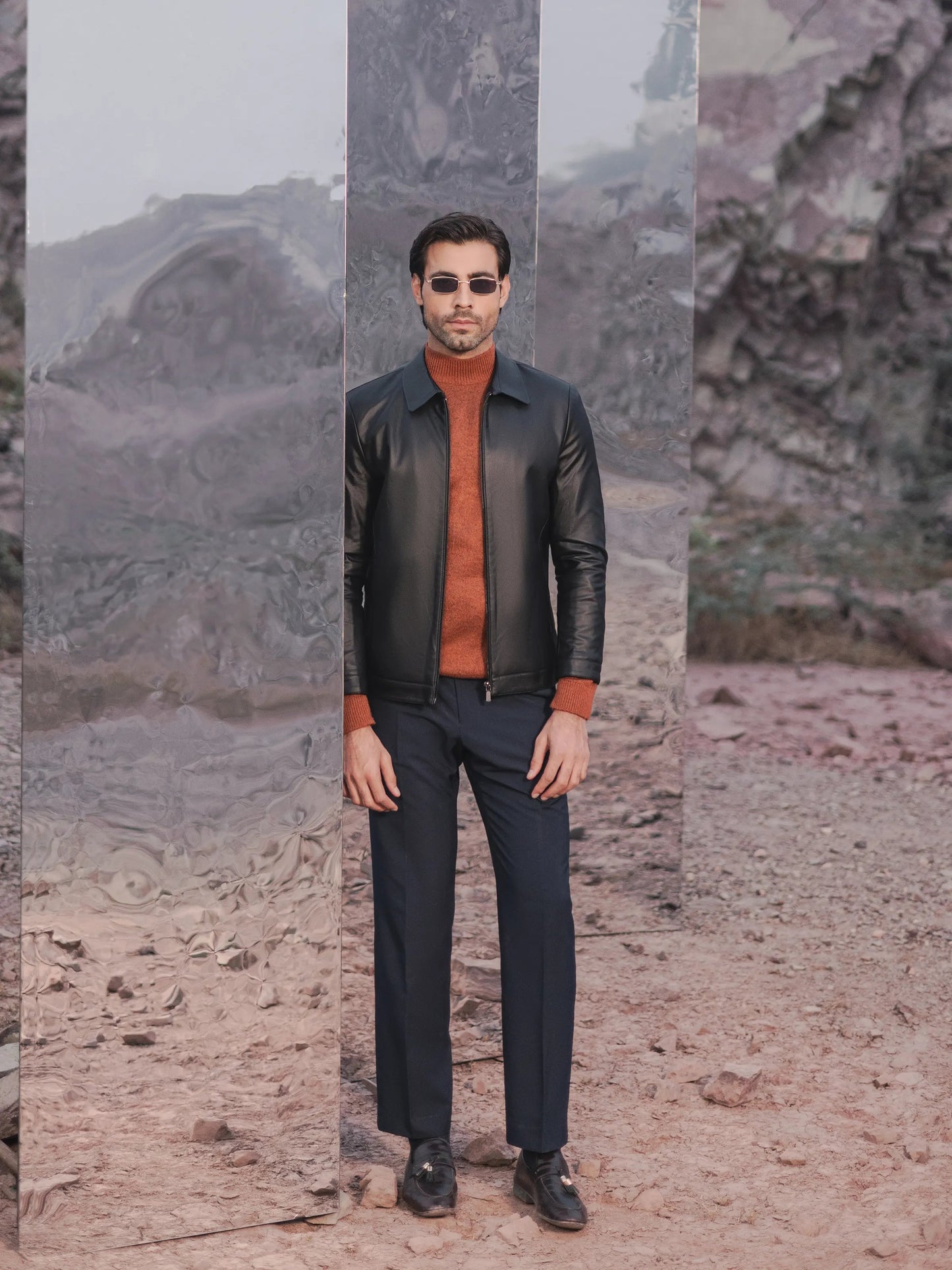 XAYWEAR men leather jacket bomber style in black worn with rust turtleneck and navy pants