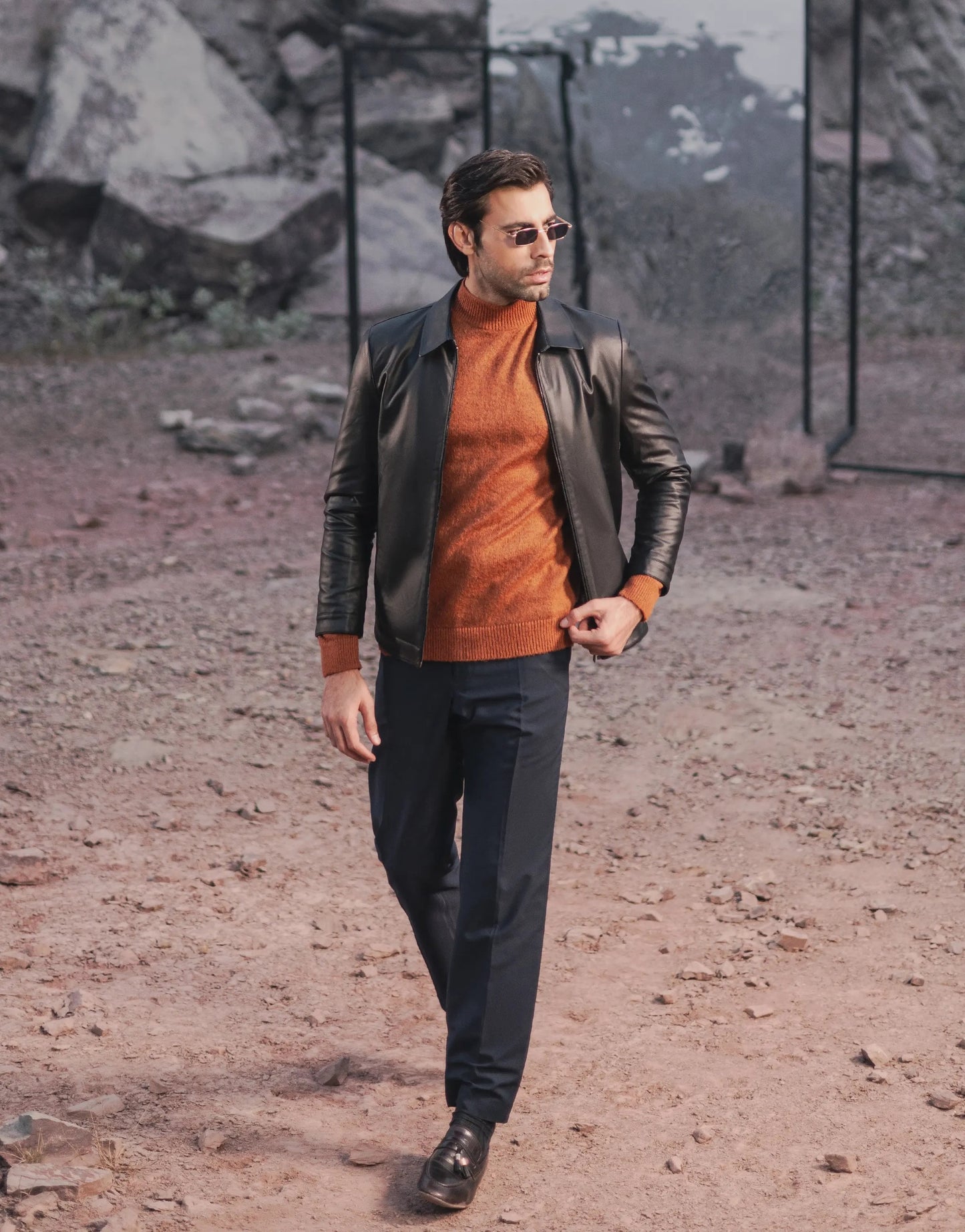 XAYWEAR men leather jacket bomber style worn with orange sweater and black pants outdoors