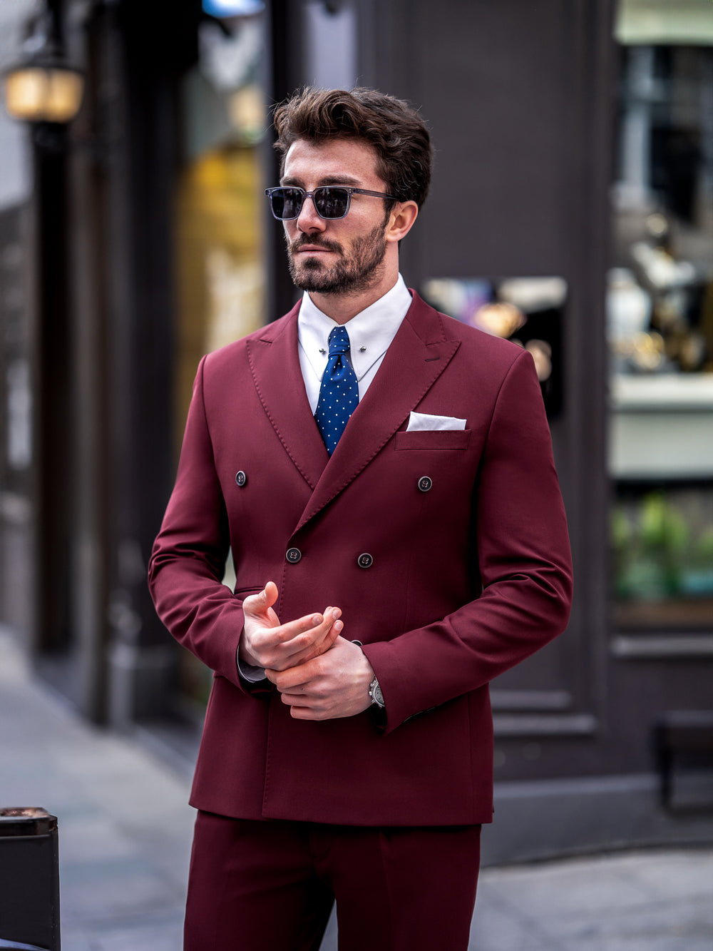 XAYWEAR stylish maroon men suit with double-breasted jacket worn with white shirt and blue tie