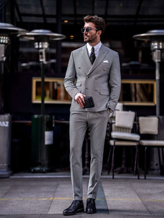 XAYWEAR gray double-breasted suit for men styled with black dress shoes and sunglasses
