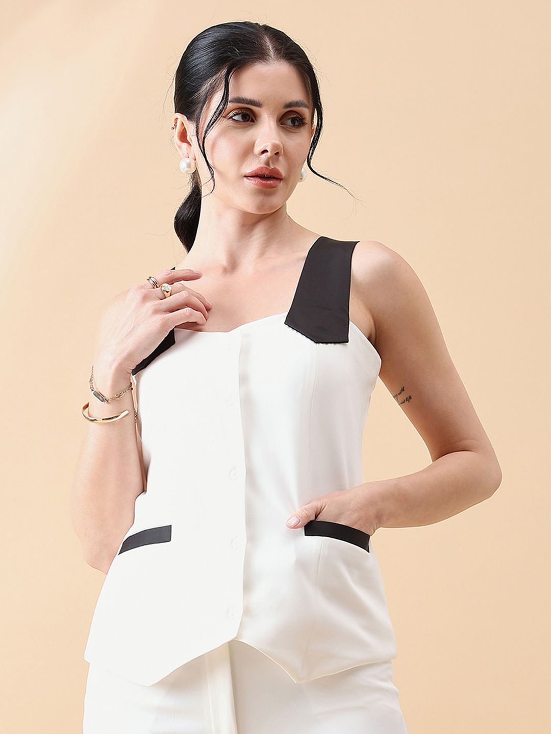 XAYWEAR white and black waistcoat for women with sleeveless design and front pockets