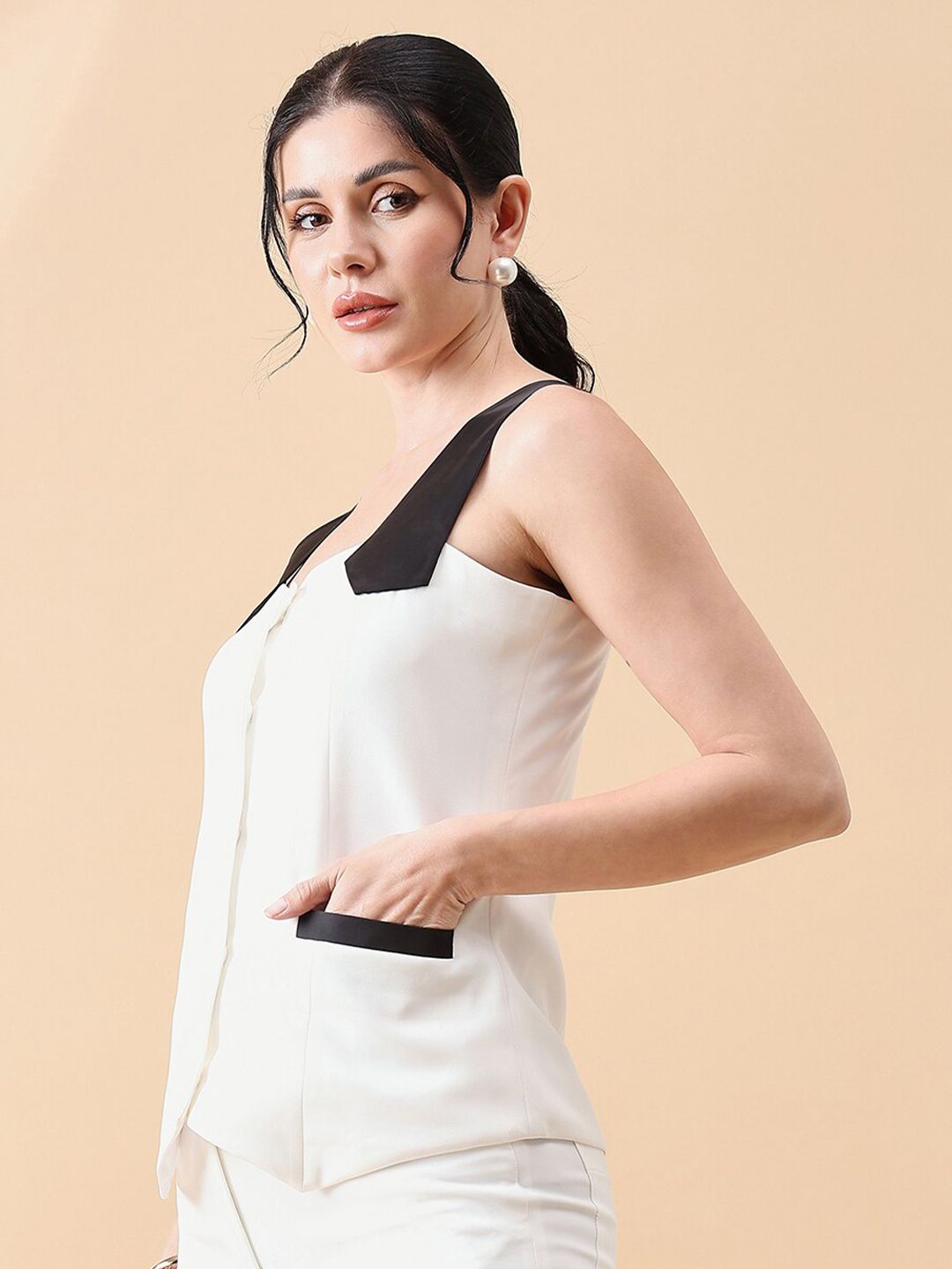 XAYWEAR white and black sleeveless waistcoat for women with stylish collar and pocket detail