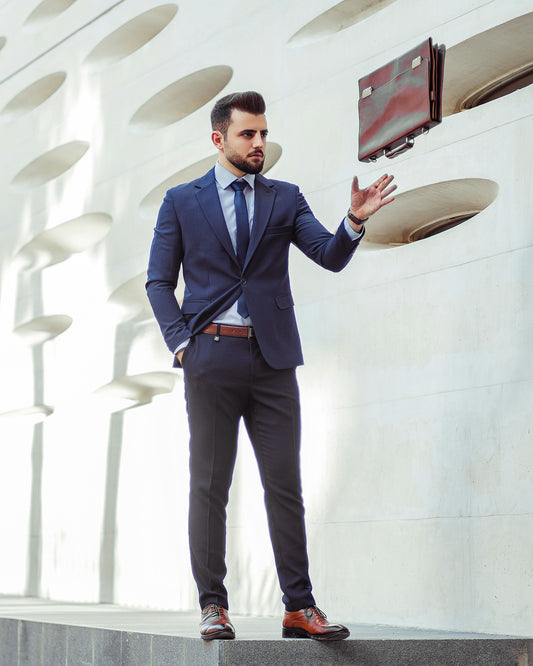 Navy Blue Formal Blazer by XAYWEAR styled with dress pants and a tie for a polished look