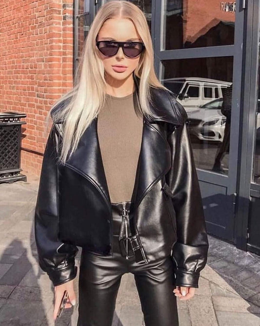 Stylish oversized faux leather jacket from XAYWEAR paired with a ribbed top for a chic urban look