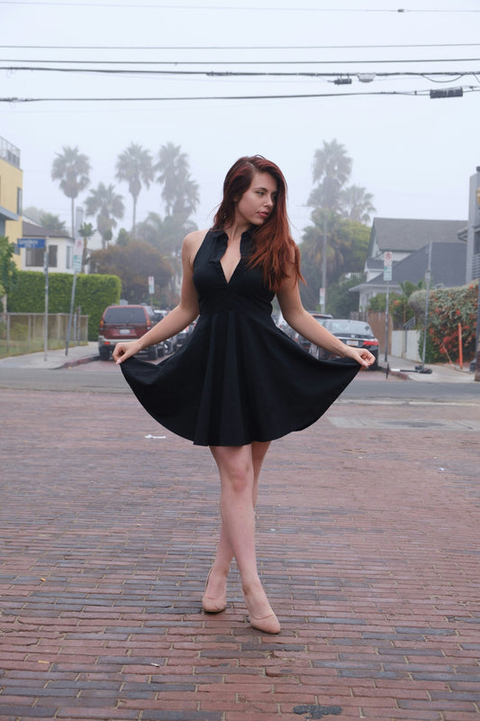 XAYWEAR party dress sleeveless black with a flared skirt, perfect for stylish occasions