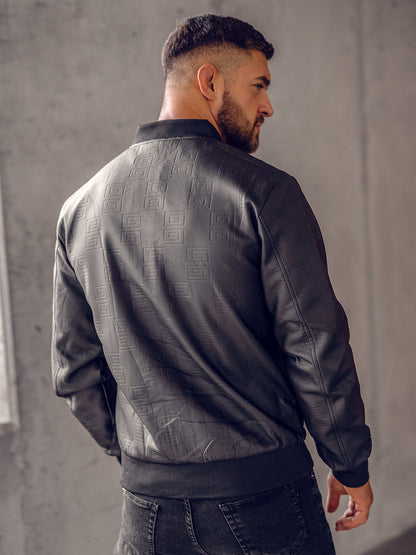 XAYWEAR black bomber jacket for men with textured pattern and ribbed cuffs on model