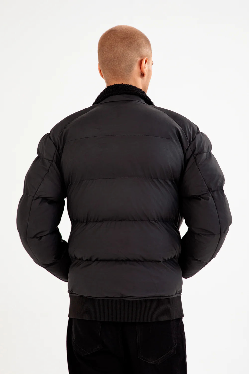 Back view of XAYWEAR puffer jacket for men in black with a cozy collar design