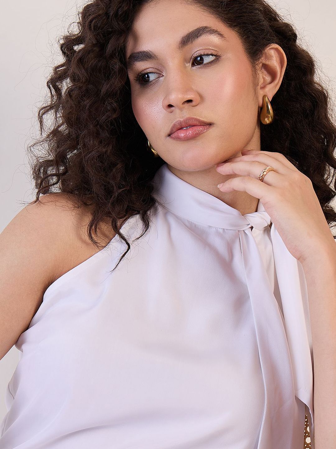 Stylish halter top in white designed by XAYWEAR for a chic and elegant look