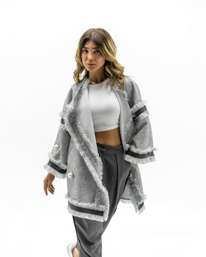 XAYWEAR stylish gray women coat with fringe details and pearl buttons over white crop top and gray pants