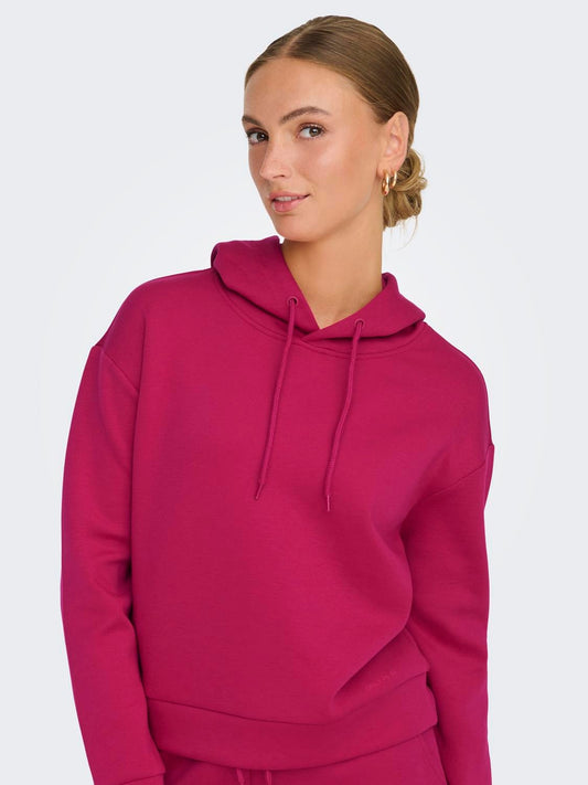Trendy relaxed fit hoodie in vibrant pink, perfect for casual wear and stylish comfort