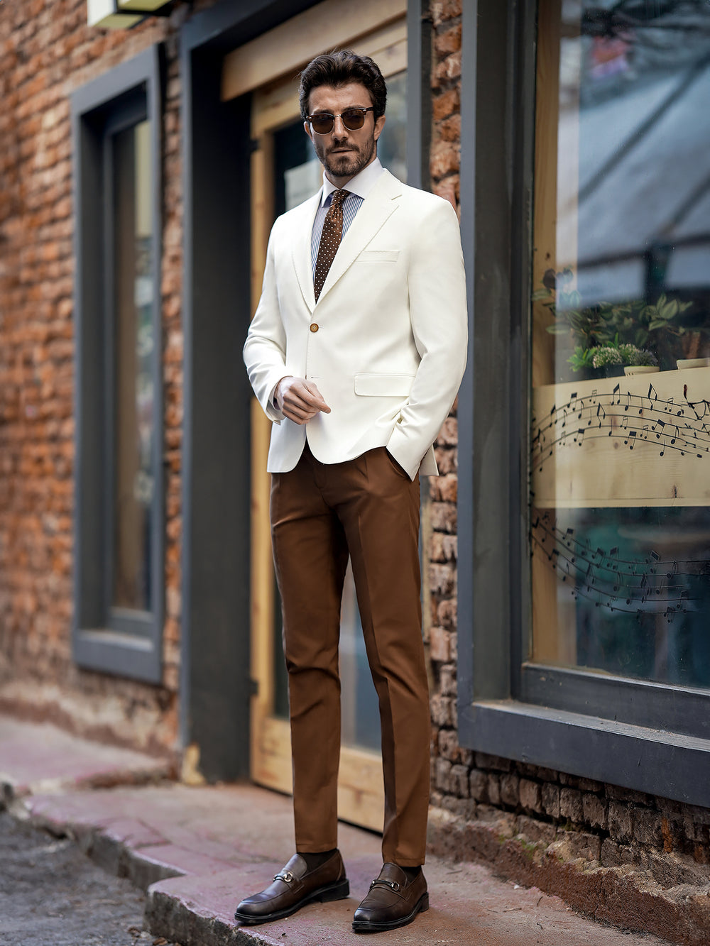 XAYWEAR stylish two piece suit for men featuring a white blazer and brown trousers