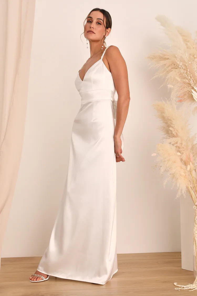 XAYWEAR elegant white bridal dress gown with spaghetti straps and a fitted waistline
