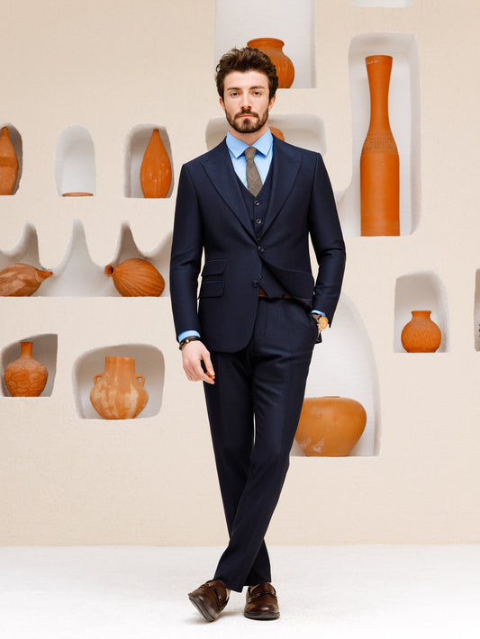 XAYWEAR navy blue suit set for men with classic fit and matching vest worn by male model