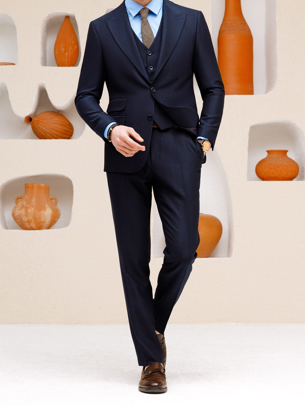 XAYWEAR navy blue suit set for men featuring a three-piece design with a tie and brown shoes
