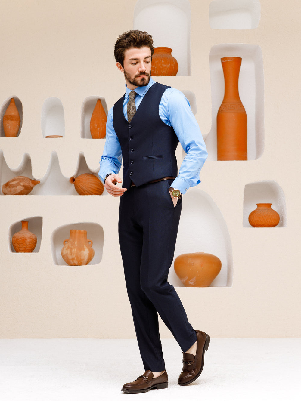 XAYWEAR suit set for men featuring navy blue vest and trousers paired with a light blue dress shirt