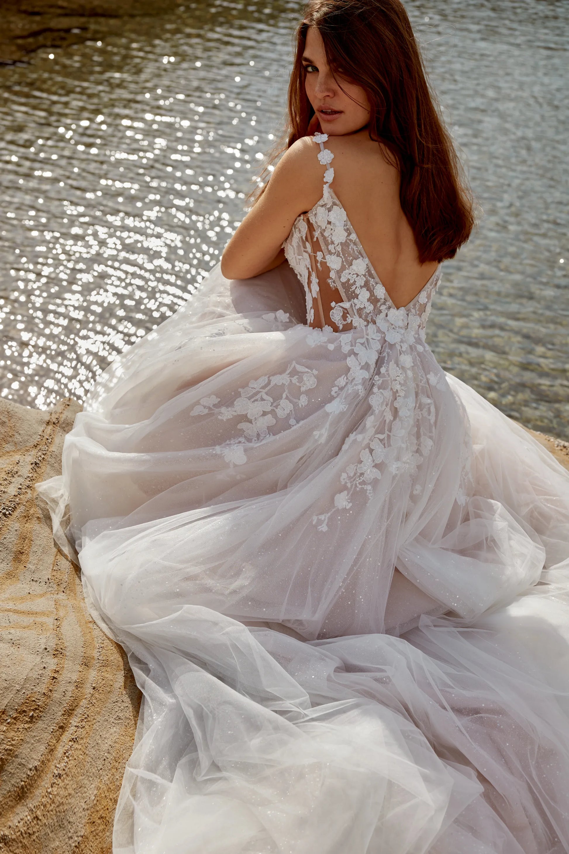 XAYWEAR elegant wedding dress gown with floral lace details and deep V back by the water