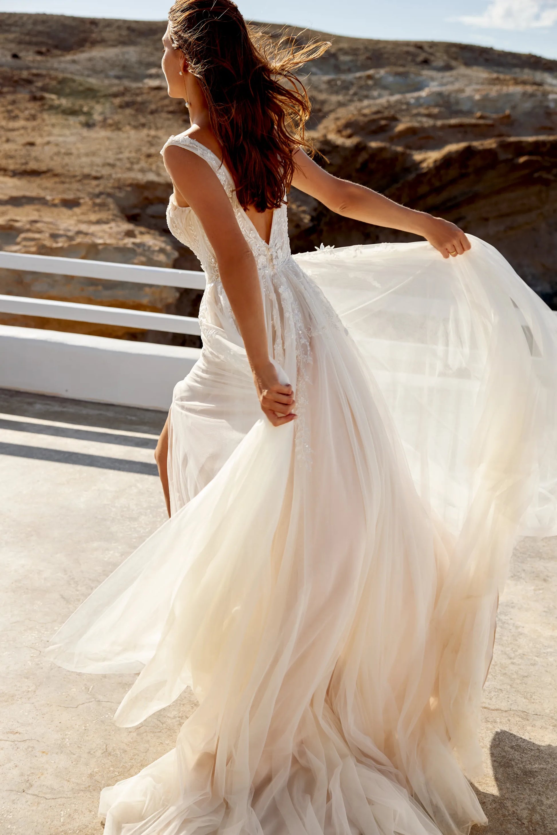 XAYWEAR wedding dress gown with flowing tulle skirt and lace back detail outdoors