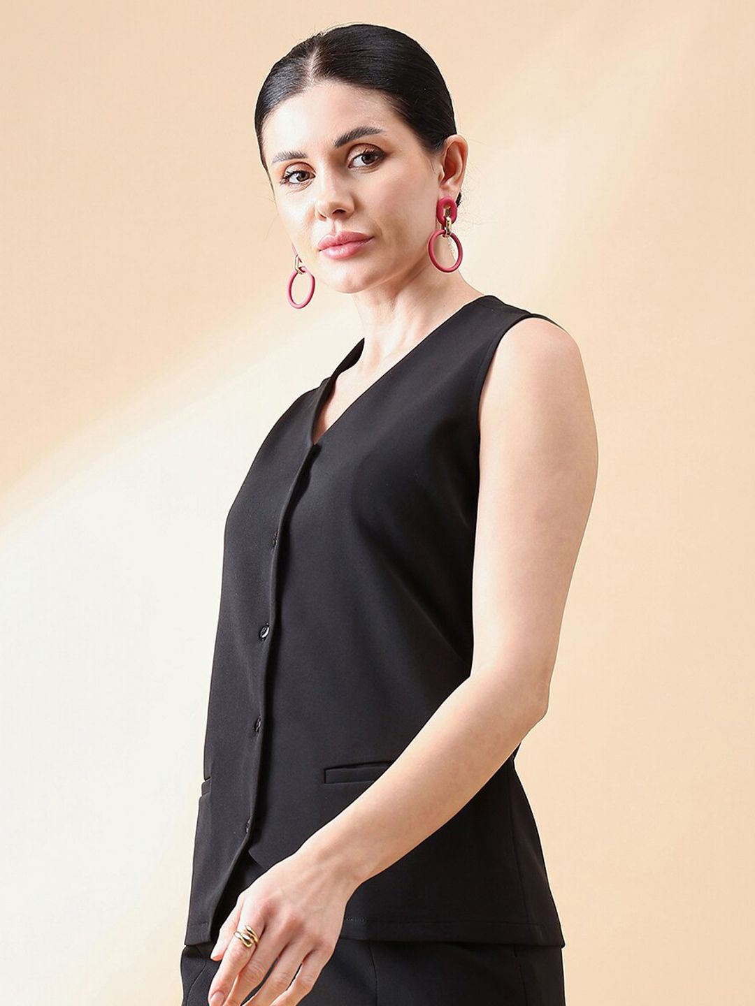 XAYWEAR black sleeveless waistcoat top with button front and V-neckline for women