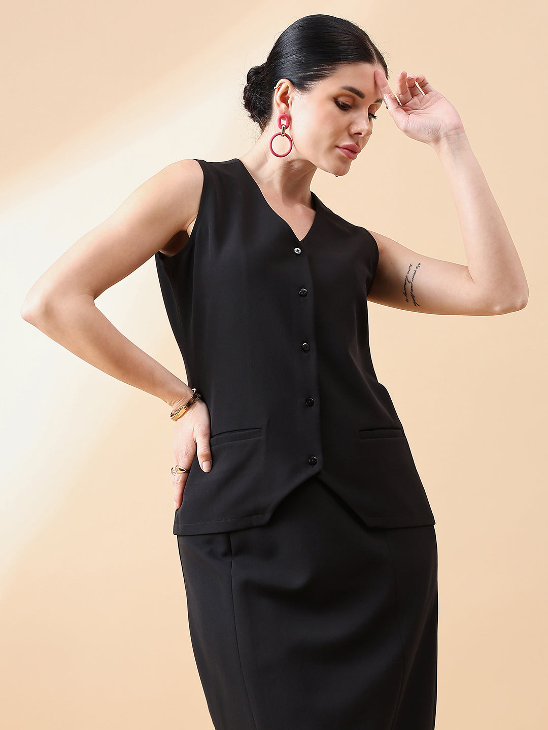 XAYWEAR black sleeveless waistcoat top with button front and pockets for women