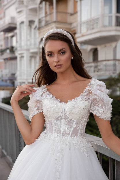 XAYWEAR elegant wedding dress with lace bodice, puff sleeves, and floral embroidery details