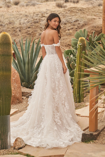 XAYWEAR off-shoulder wedding dress gown with floral lace details and long train shown outdoors