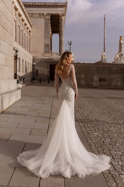 XAYWEAR elegant wedding dress gown with long lace sleeves and flowing tulle train outdoors