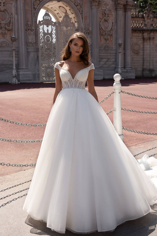 XAYWEAR elegant wedding dress with off-shoulder lace bodice and full tulle skirt outdoors