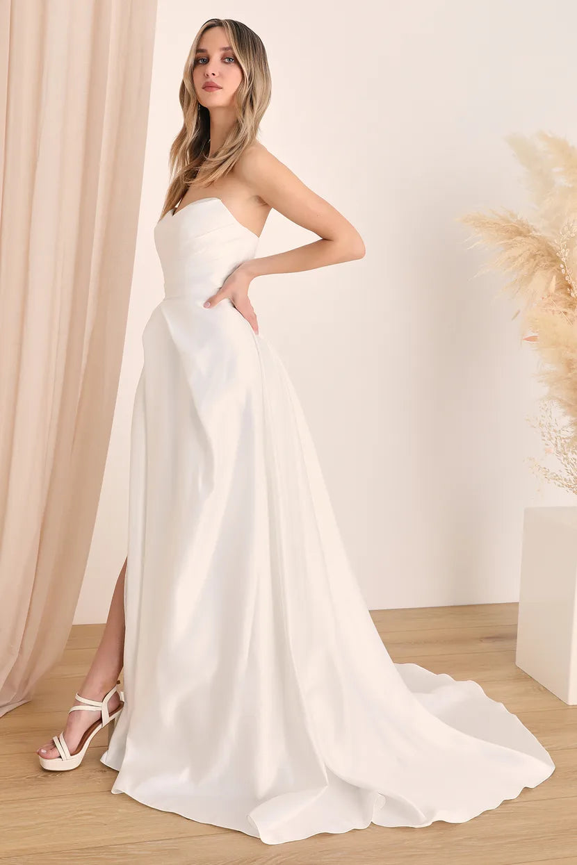 XAYWEAR elegant strapless white bridal dress with a flowing train and side slit