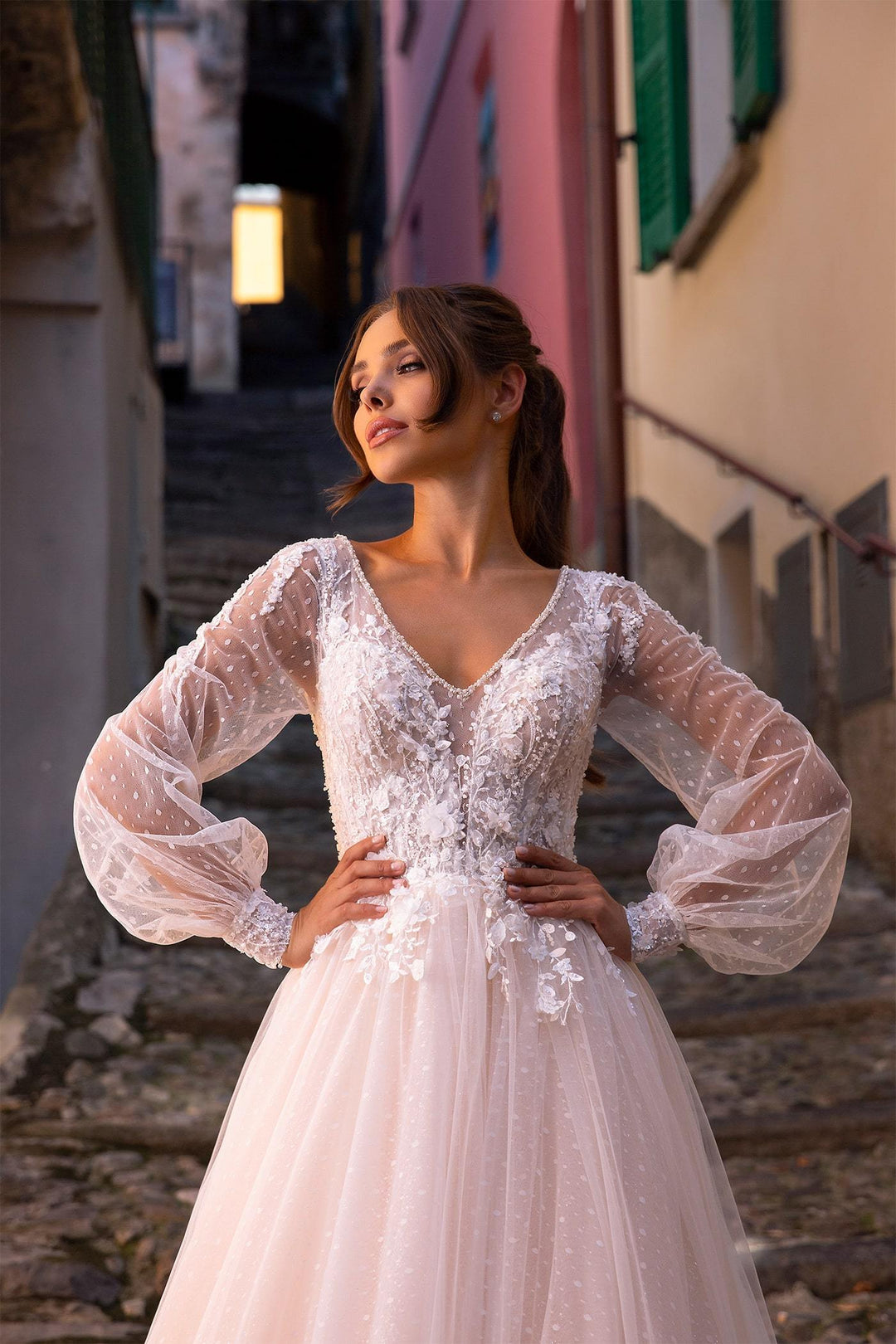 XAYWEAR elegant white bridal gown with sheer long sleeves and floral lace bodice details