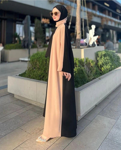 Elegant women black abaya with a stylish beige front design, perfect for modern fashion