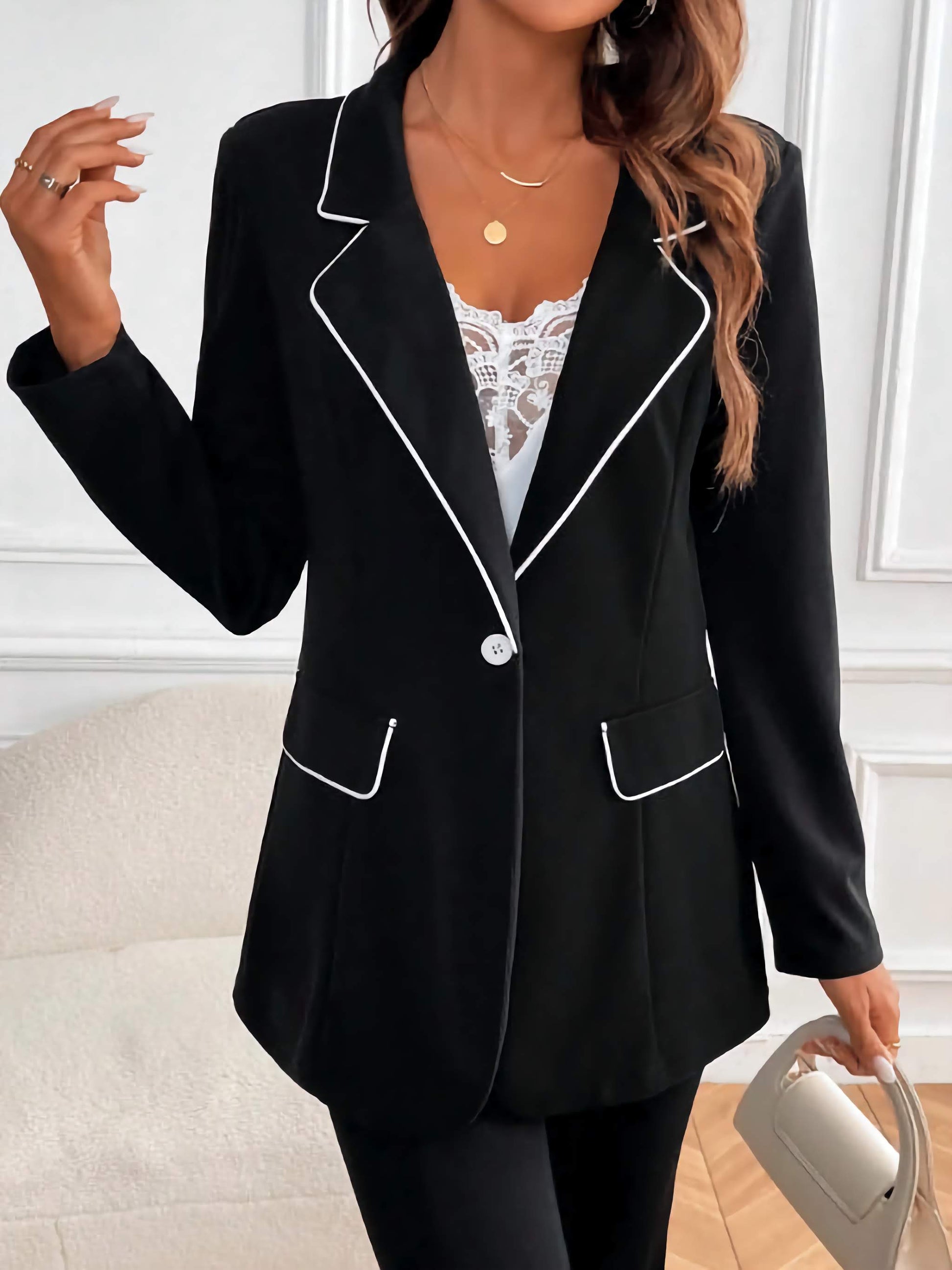 XAYWEAR women black suit set with white piping details on blazer pockets and lapels