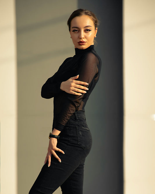 XAYWEAR women black top with sheer long sleeves styled with black pants