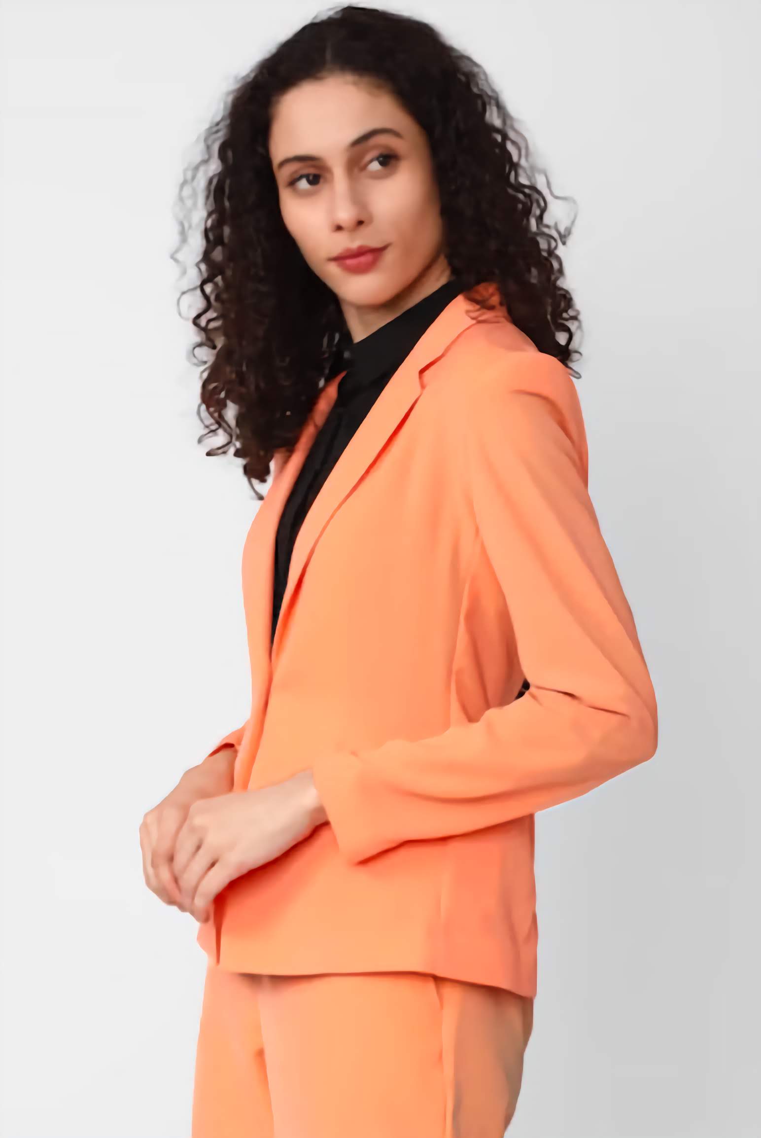 XAYWEAR peach suit with blazer and pants styled as a women business outfit for formal occasions