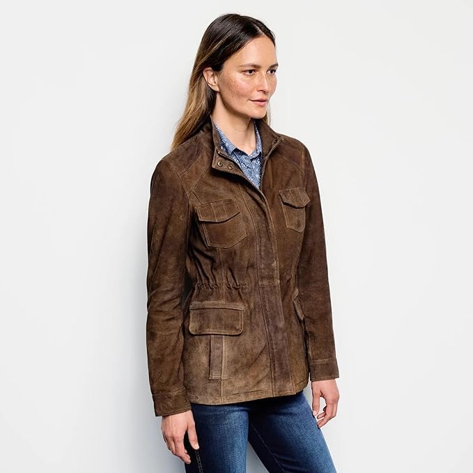 XAYWEAR brown suede women jacket with front pockets and zipper closure modeled with blue jeans