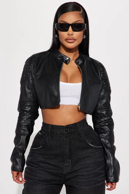 XAYWEAR black cropped women leather jacket styled with high-waisted jeans and sunglasses