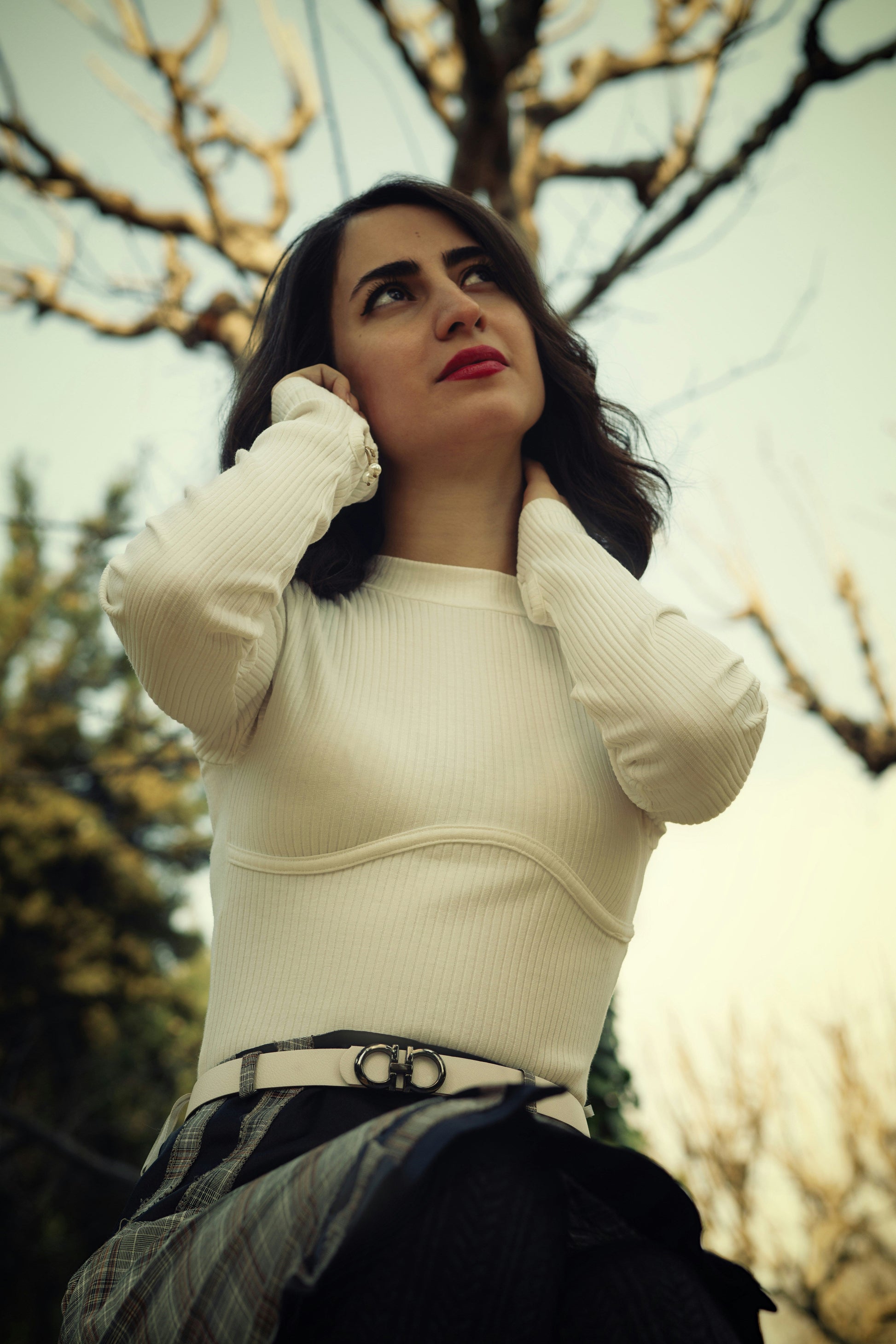 Stylish ribbed white top for women, perfect for casual or trendy outfits, featuring a flattering fit