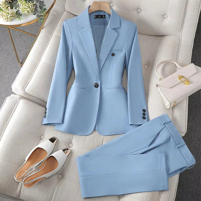 Light blue suit for women by XAYWEAR featuring a tailored blazer and matching trousers