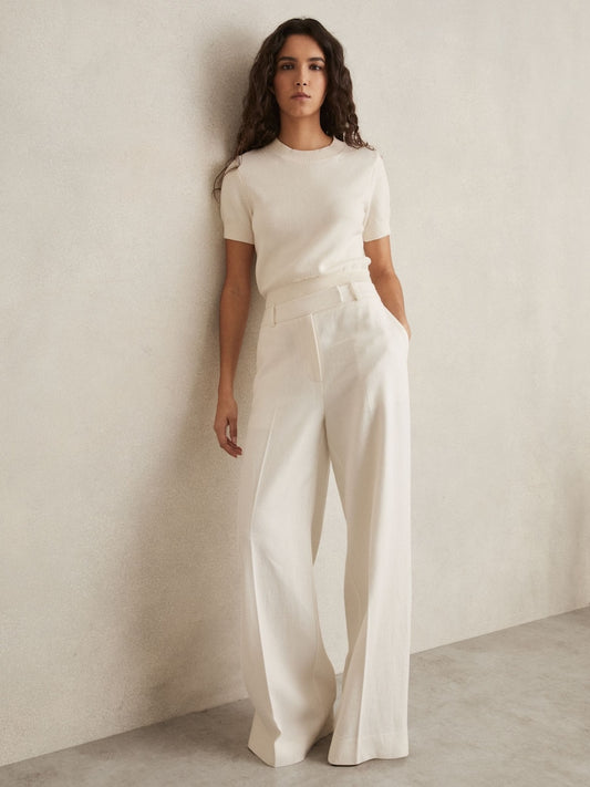 XAYWEAR women trouser in cream color with wide-leg fit styled with a matching short sleeve top